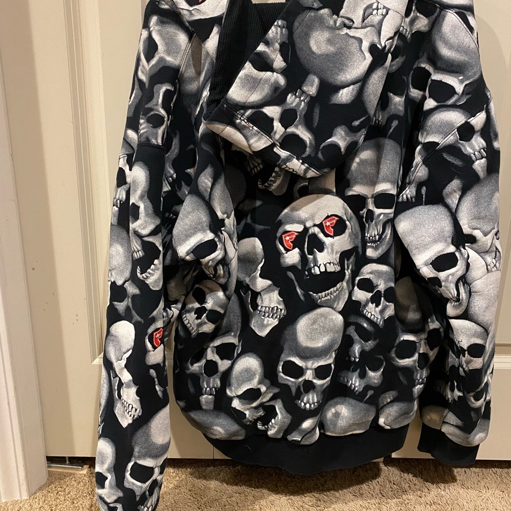 COPY - Vintage Early 2000s FAMOUS STARS STRAPS Skull Hoodie in very good condit…